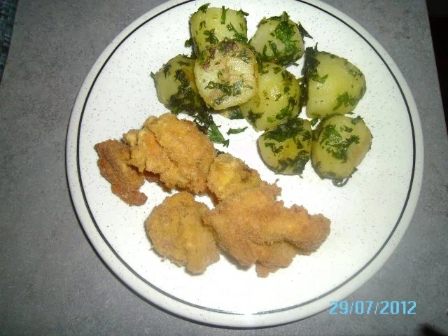 Panierte Eierschwammerln mit Petersilkartoffeln - Rezept