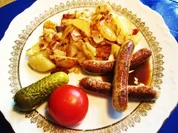 Bratkartoffeln mit Nürnberger Würsteln - Rezept