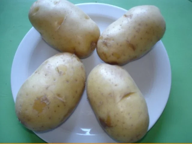 Rezept: Rippchen mit Krautsalat und Ofenkartoffeln mit Sour Cream Bild Nr. 2 Rippchen mit Krautsalat und Ofenkartoffeln mit Sour Cream - Rezept - Bild Nr. 2