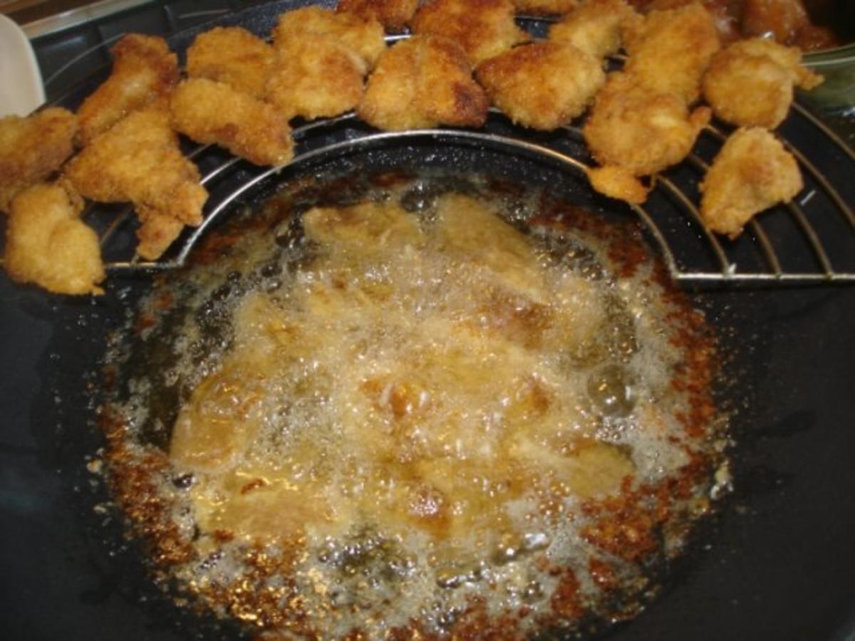 Hähnchennuggets mit Wokgemüse und Pommes frites - Rezept - Bild Nr. 9