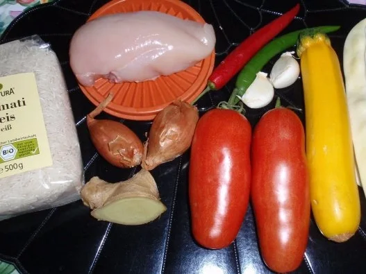 Rezept: scharfe Hähnchenbrust auf Gemüse mit Tomatenreis Bild Nr. 2 scharfe Hähnchenbrust auf Gemüse mit Tomatenreis - Rezept - Bild Nr. 2