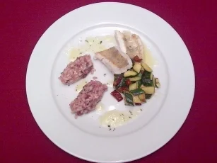 Zanderfilet mit Blutwurst-Risotto und tomatisierten Zucchini - Rezept