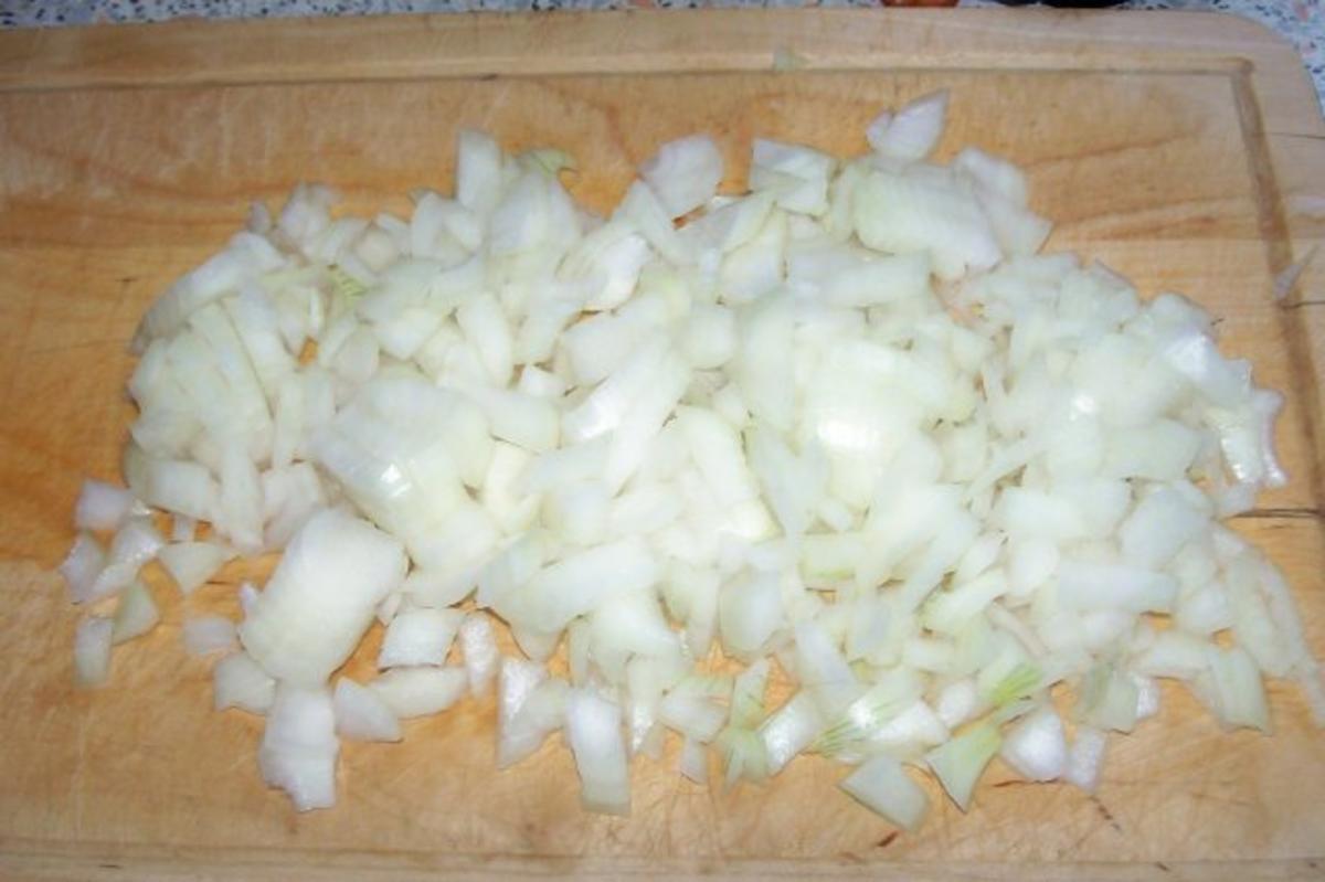Geschmortes Hähnchenragout mit Pflaumen-Zimt-Couscous - Rezept - Bild Nr. 3