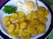 Kartoffelblüten mit Spiegelei und Radisalat - Rezept