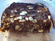 Auberginen mit Reis und Hackfleisch und Dattelsauce - Rezept