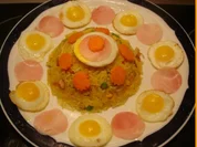 Wachtel-Spiegeleier mit „ gebratener Eierreis à la Papa " *) - Rezept