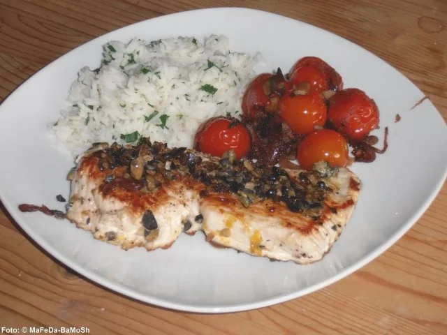 Rezept: Putenschnitzel mit Schmortomaten Putenschnitzel mit Schmortomaten - Rezept