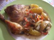 Hähnchenkeulen auf Gmüse im Römertopf mit Federweißen - Rezept