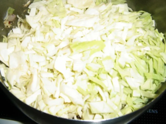 Rezept: Hähnchen-Kraut-Schmorpfanne Bild Nr. 6 Hähnchen-Kraut-Schmorpfanne - Rezept - Bild Nr. 6