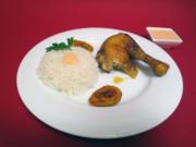 Maishähnchen mit gebratenen Kochbananen, dazu Reis und Huancaina-Sauce - Rezept