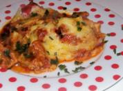 Rezept: Deftiger Maultaschenauflauf mit Schinken und Tomatensoße Deftiger Maultaschenauflauf mit Schinken und Tomatensoße - Rezept