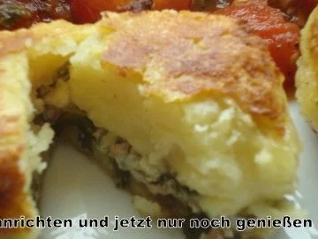 Rezept: Gefüllte Kartoffelklöse auf Schmortomaten Gefüllte Kartoffelklöse auf Schmortomaten - Rezept