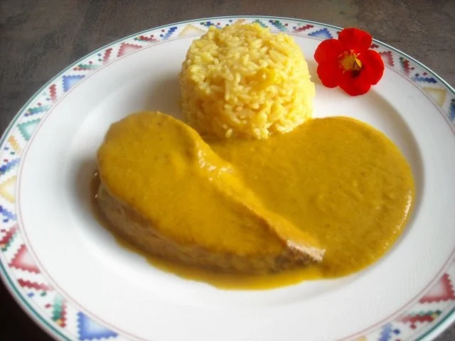 Rezept: Putenbrust mit Karotten-Quitten-Sauce Putenbrust mit Karotten-Quitten-Sauce - Rezept