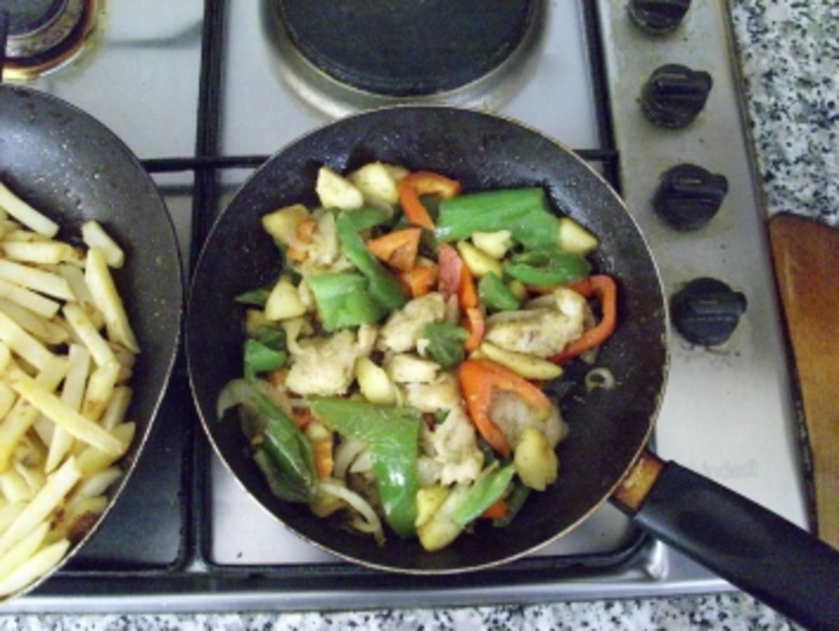 Pangafilet an Gemüse  mit Pommes frites - Rezept