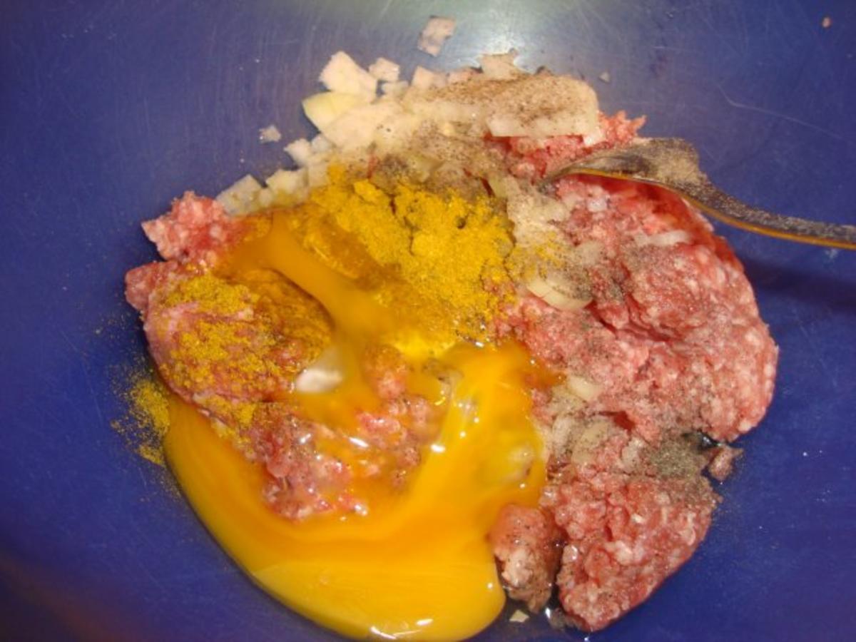 gefüllte Paprika auf einem Reisbett - Rezept - Bild Nr. 3