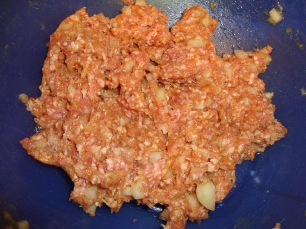 gefüllte Paprika auf einem Reisbett - Rezept - Bild Nr. 4