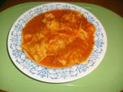 Selbst gemachte Ravioli in Tomatensoße - Rezept