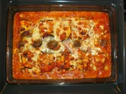 Auberginenröllchen auf Tomate - Rezept