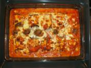 Auberginenröllchen auf Tomate - Rezept