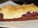 Käsekuchen mit Kirschen und Makronenstreusel - Rezept
