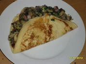 Gefüllte Eierkuchen mit Pilzen - Rezept