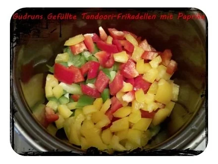 Rezept: Hackfleisch: Gefüllte Tandoori-Frikadellen mit Paprikagemüse Bild Nr. 4 Hackfleisch: Gefüllte Tandoori-Frikadellen mit Paprikagemüse - Rezept - Bild Nr. 4