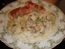 Hähnchenfilet im Speckmantel mit Champignon-Sahnesauce - Rezept