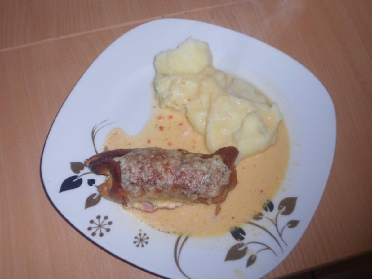 Pikante Schweineroulade überbacken mit Käsesauce - Rezept - kochbar.de