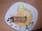 Pikante Schweineroulade überbacken mit Käsesauce - Rezept