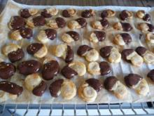 Plätzchen & Kekse : Kleine Schweineohren mit Schokolade - Rezept