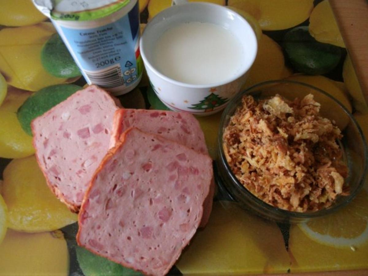 gebratener Fleischkäse mit Weinsauerkraut und Röstzwiebelstampfkartoffeln - Rezept - Bild Nr. 2