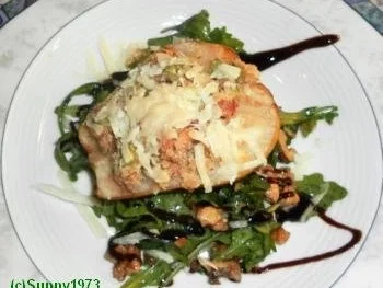 Überbackene Birne auf Rucolasalat - Rezept