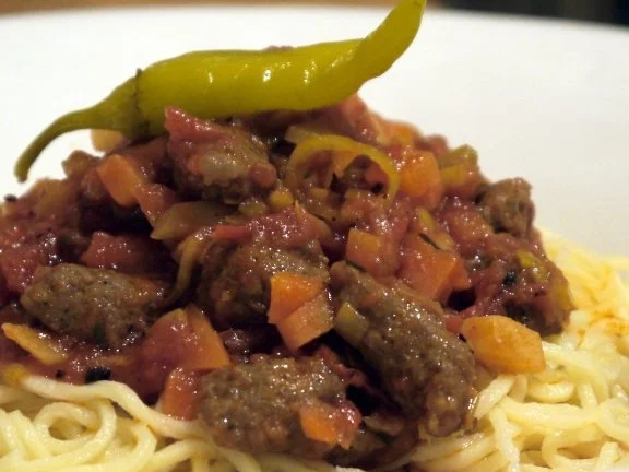 Spaghetti mit Merguez-Tomaten-Sauce - Rezept