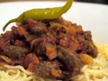 Spaghetti mit Merguez-Tomaten-Sauce - Rezept