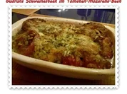 Fleisch: Pikantes Schweinesteak im Tomaten-Mozarella-Nest - Rezept