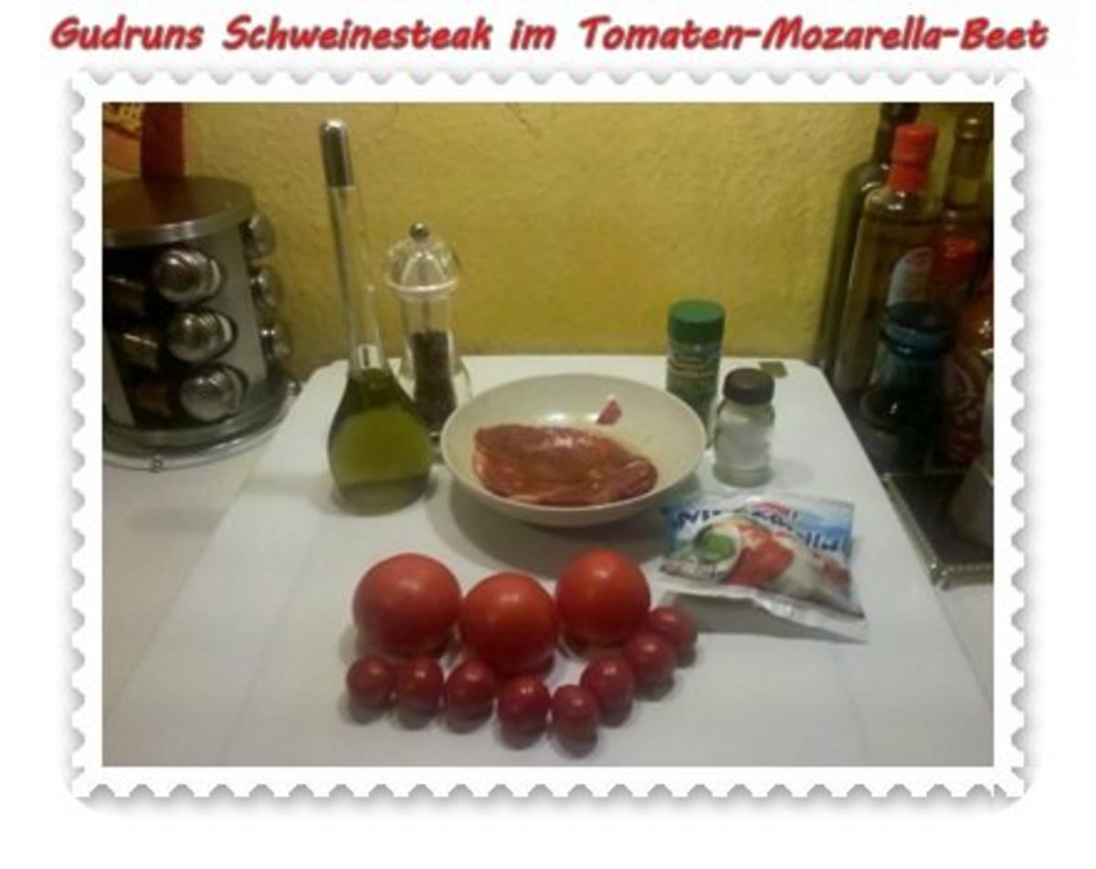 Fleisch: Pikantes Schweinesteak im Tomaten-Mozarella-Nest - Rezept - Bild Nr. 3