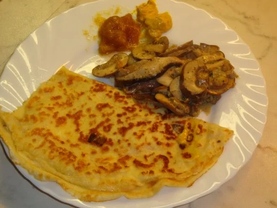 Rezept: Pfannkuchen mit Käse oder Schinkenfüllung mit Pilzen Bild Nr. 6 Pfannkuchen mit Käse oder Schinkenfüllung mit Pilzen - Rezept - Bild Nr. 6