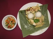 Gekochtes Huhn mit Curry und Kokosnuss an Gemüse auf Basmatireis - Rezept