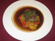 Kalbsfilet mit Kräuterkruste auf Toskanagemüse an Jus - Rezept