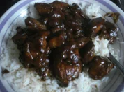 Hühnchen-Sate mit dunkler Erdnuss-Sauce und Basmatireis - Rezept