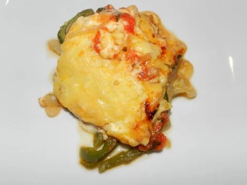 Rezept: Überbackene Schweinemedaillons auf Gemüse Überbackene Schweinemedaillons auf Gemüse - Rezept