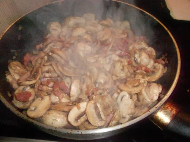 Rezept: Schweinefilet im Speckmantel an Champignonrahm-Pfännchen und Pommes Noisettes Bild Nr. 3 Schweinefilet im Speckmantel an Champignonrahm-Pfännchen und Pommes Noisettes - Rezept - Bild Nr. 3