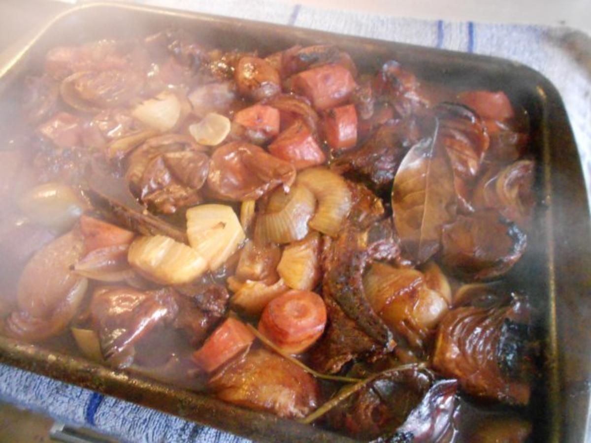 Schweinefilet im Speckmantel an Champignonrahm-Pfännchen und Pommes Noisettes - Rezept - Bild Nr. 2