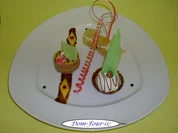 Vanillesahne im Florentinertörtchen & Schoko-Orangen-Sahne mit Mangoscheiben als Törtchen - Rezept