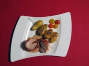 Gefülltes Schweinefilet mit Pesto Rosso im Parmamantel, dazu Rosmarinkartoffeln - Rezept