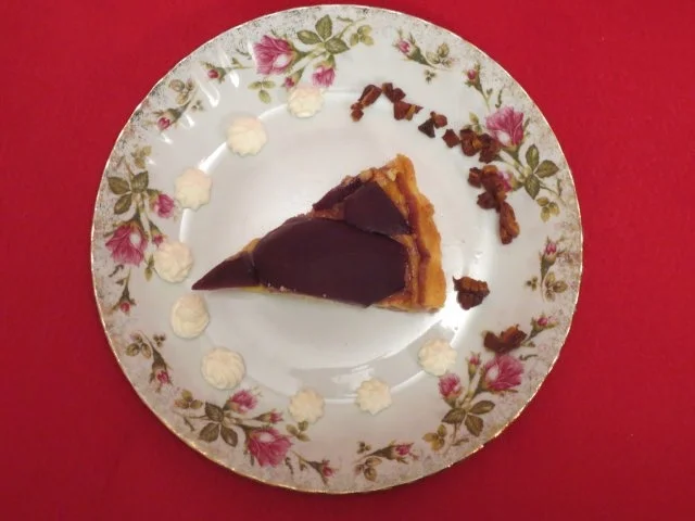 Rezept: Rotweinbirnentarte auf Konditorencrème Rotweinbirnentarte auf Konditorencrème - Rezept