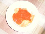 Handgemachte Ravioli mit Käse - Hackfleisch - Füllung an Tomatensosse - Rezept