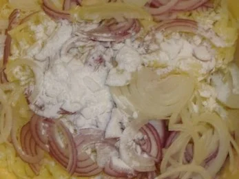 Rezept: Kartoffel-Zwiebel-Rösti mit pochiertem Ei und Feldsalat Bild Nr. 2 Kartoffel-Zwiebel-Rösti mit pochiertem Ei und Feldsalat - Rezept - Bild Nr. 2