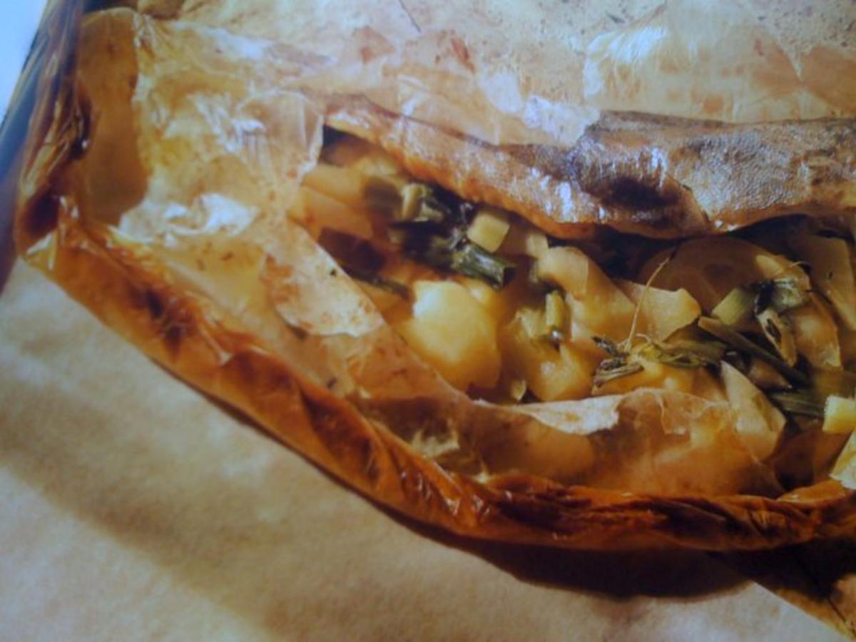 Gebackene Forelle in Backpapier mit Apfelfülle - Rezept - kochbar.de