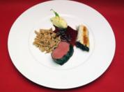Hirschkalbsrücken mit Preiselbeersoße, Sellerie-Confit mit grünem Apfel, Maronenspätzle - Rezept